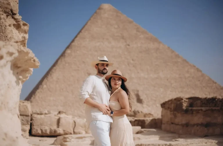A couple visiting the Giza Pyramids