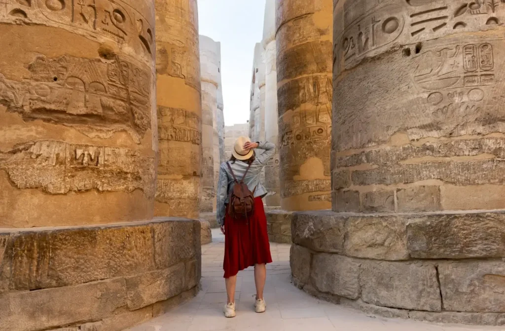 A woman inside Karnak Temple