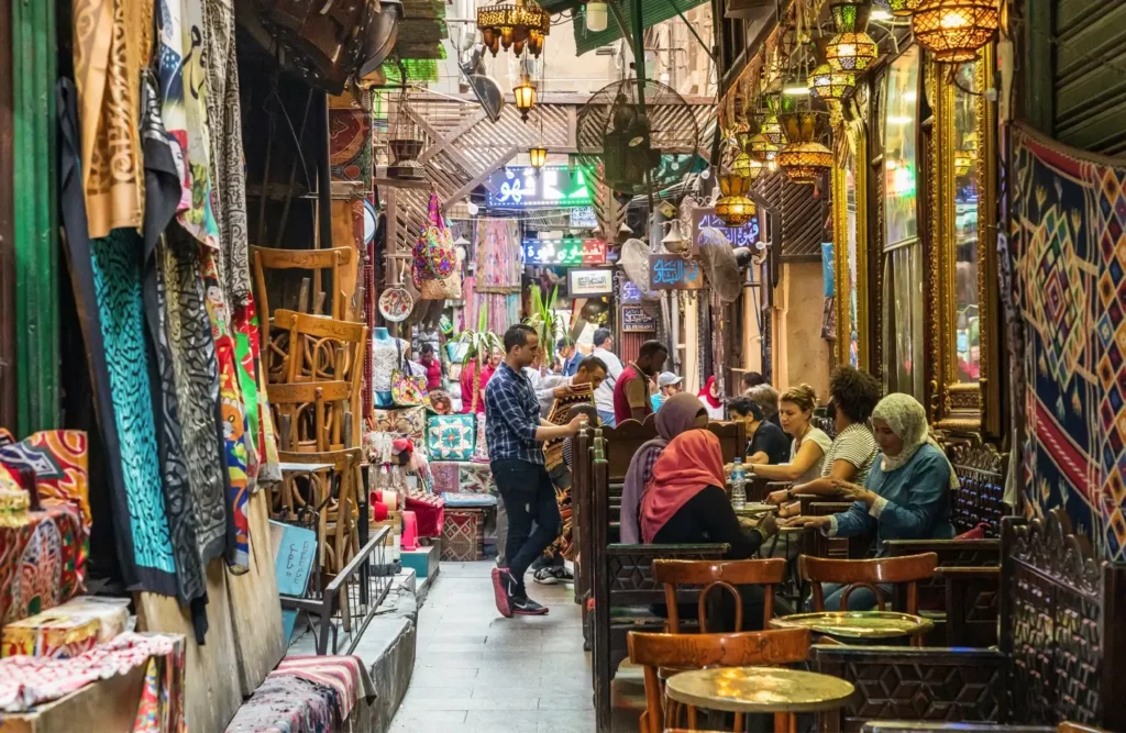 Visitors sitting in a cafe inside Khan El Khalili